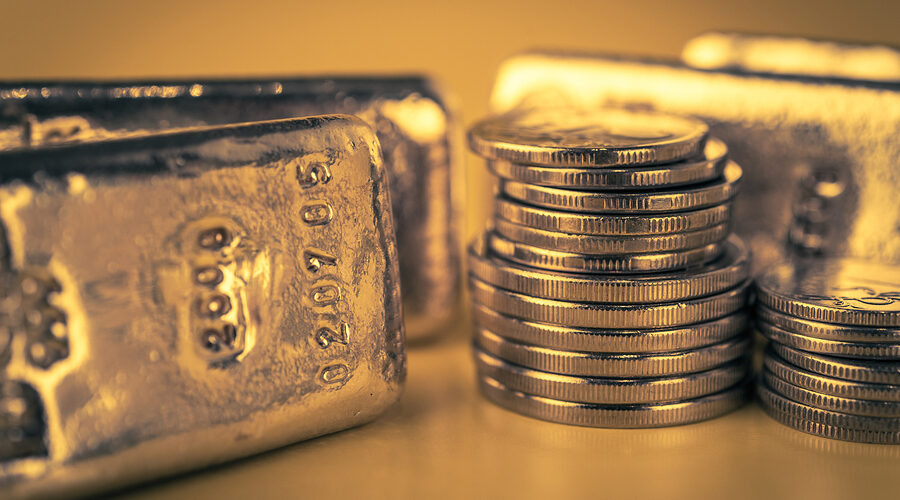 Gold Bars And Stack Of Gold Coins